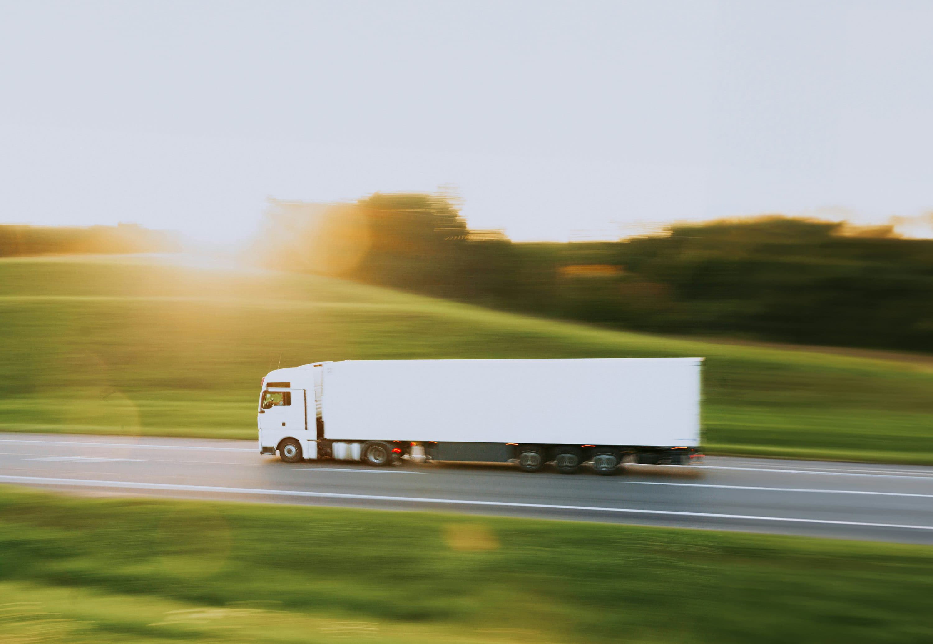 Transport truck representing fleet and delivery management software